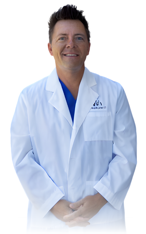 Dr. Chris Gauquie in white coat 