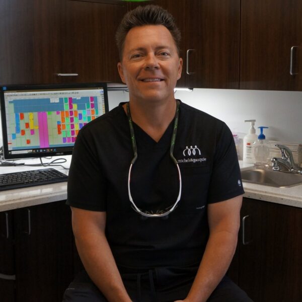 Dr. Chris Gauquie providing toothache relief and emergency dental care in Greenville NC