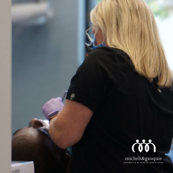 Dr. Sarah Harrell providing emergency dental repair for a lost crown in Greenville NC